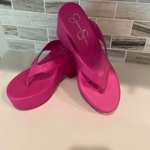 Jessica Simpson, pink Barbie platform sandals.